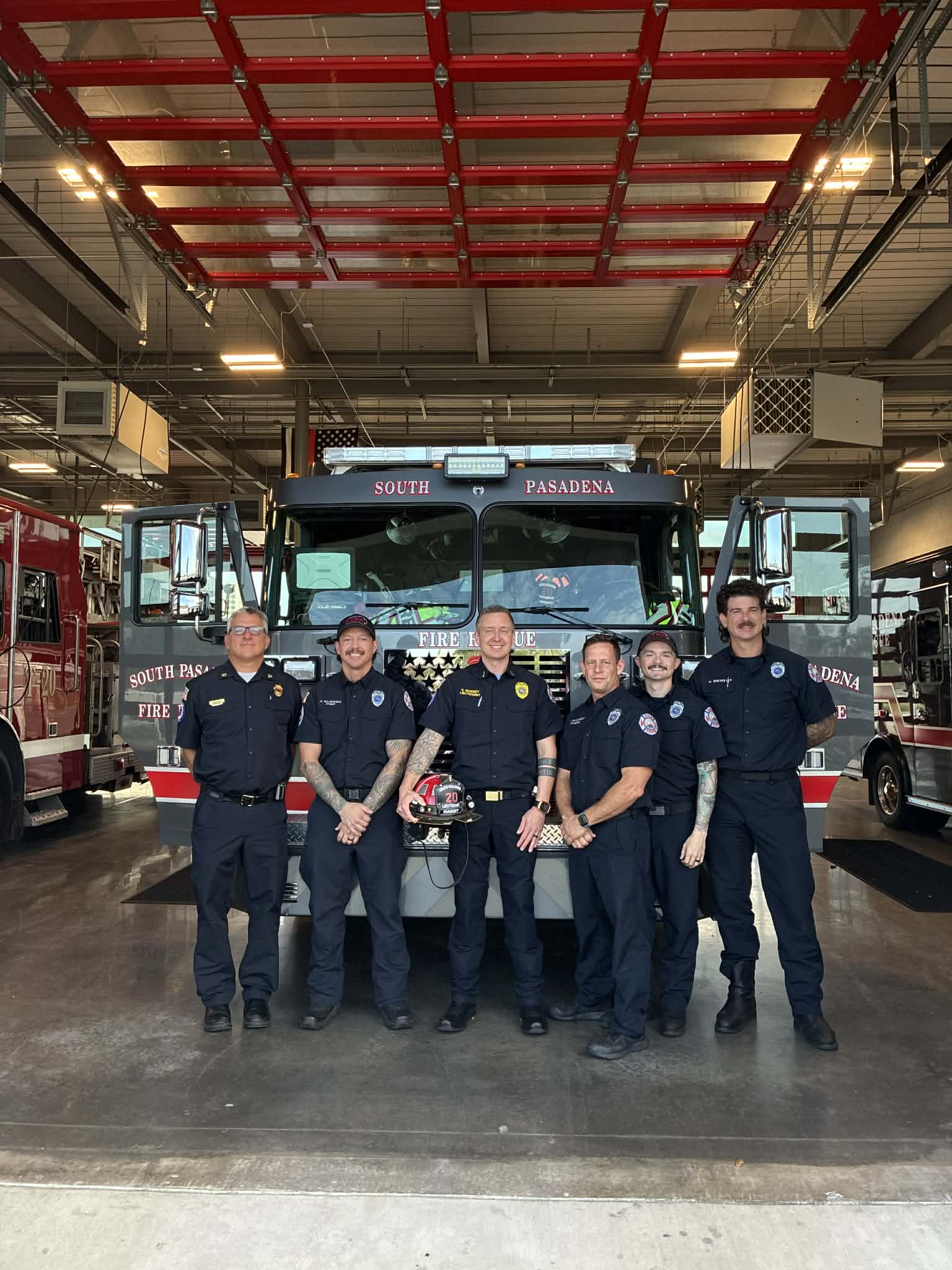 Men Posing in front of Fire Truck